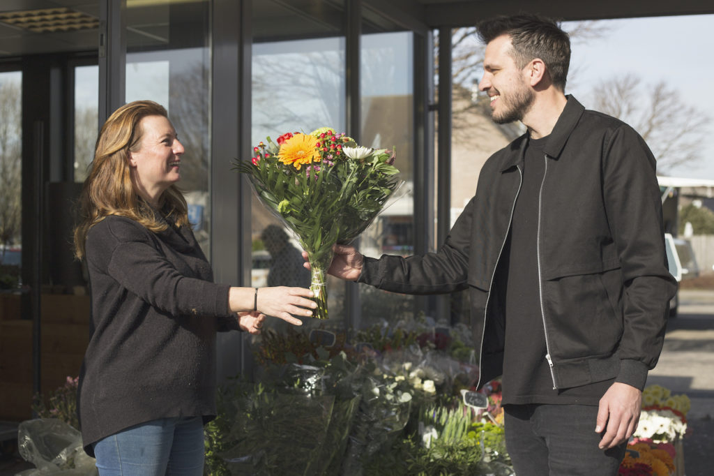 Flower Delivery Almere Selling Flowers to a Customer